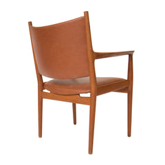 #1077 Set of 8 Hans Wegner Arm Chairs in Leather