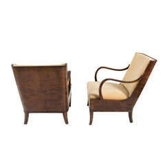 #295 Pair of Lounge Chairs by Erik Chambert